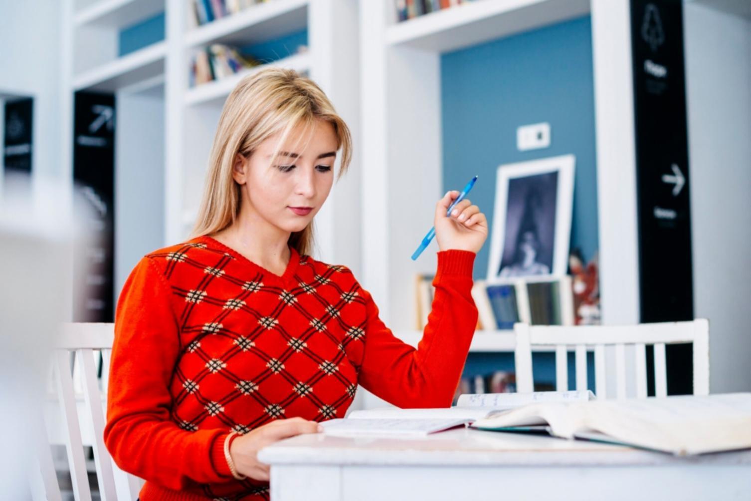 Collaborative financial planning session with documents and strategic planning materials