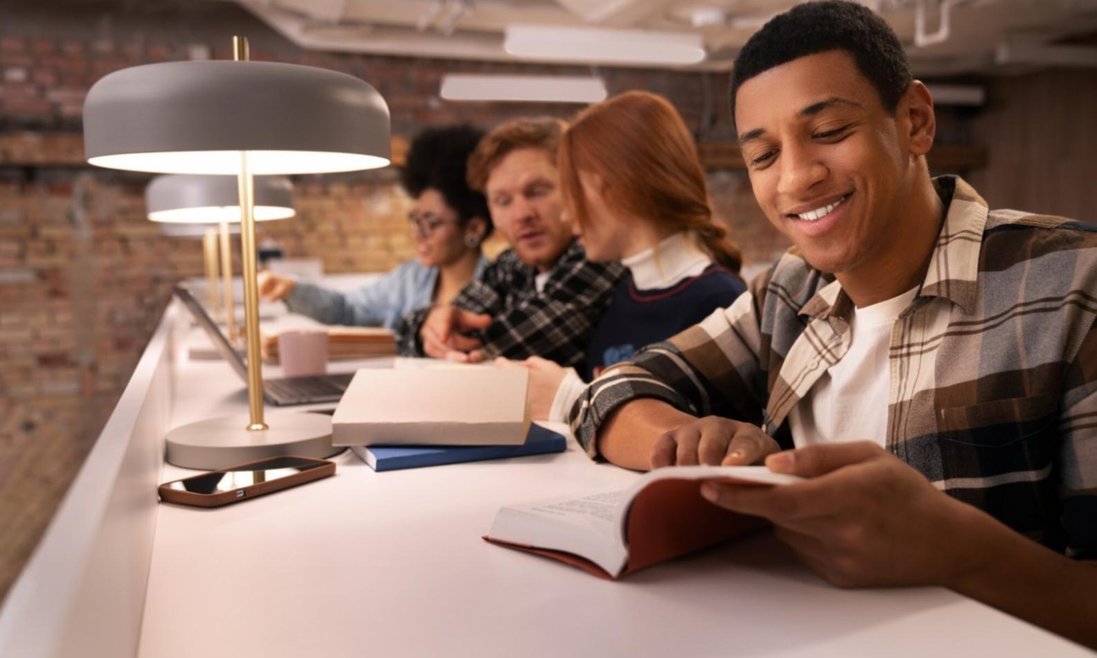 Modern classroom setting with business professionals engaged in financial planning workshop and collaborative learning